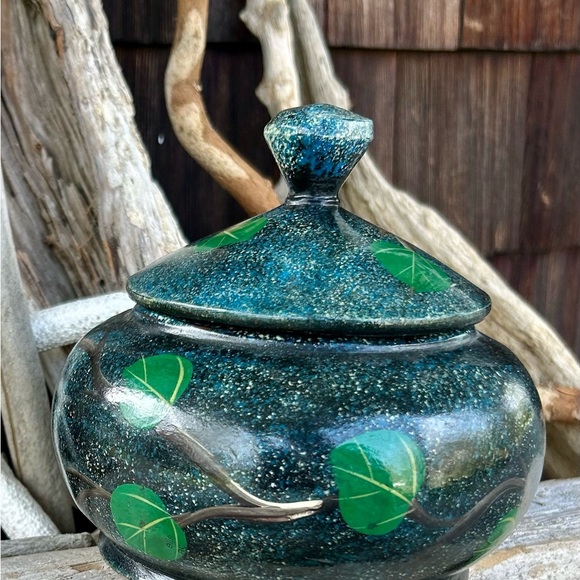 Hand Painted Wooden Jar with Red Macaw Parrot and Tree Design against a Dark Sky - Picture 3 of 9